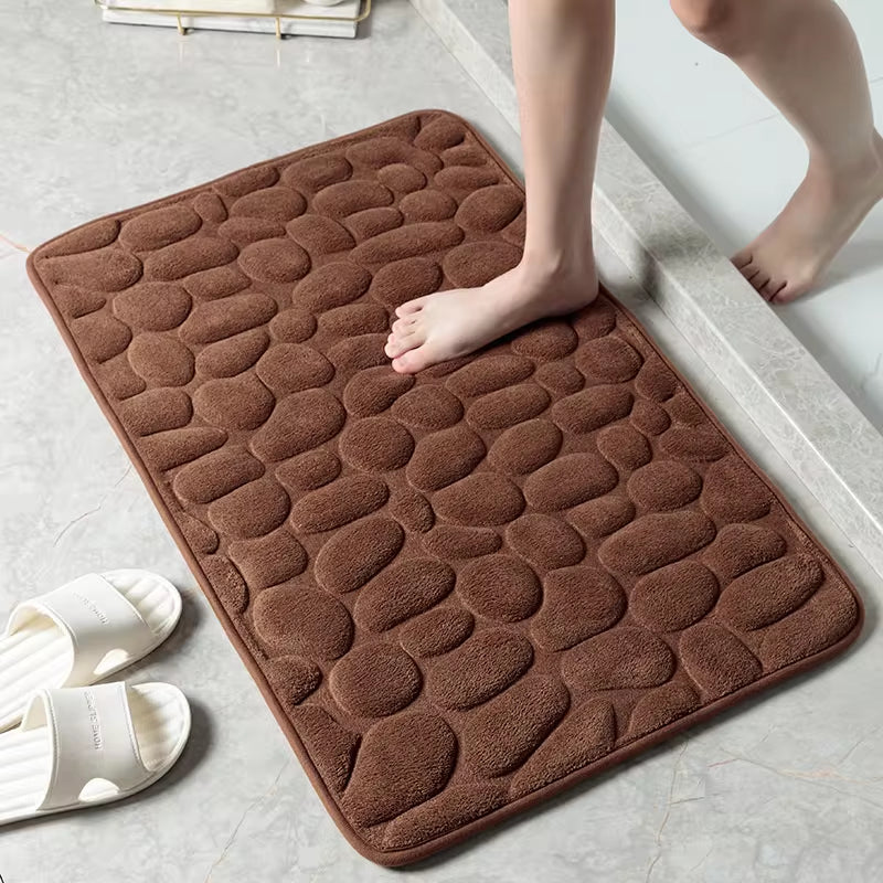 Transform your bathroom with our stylish Cobblestone Embossed Non-Slip Bath Mat! Perfect for the shower, bathtub, or wash basin, this memory foam rug adds comfort and safety to your space. 🛁✨ #HomeDecor #BathroomEssentials