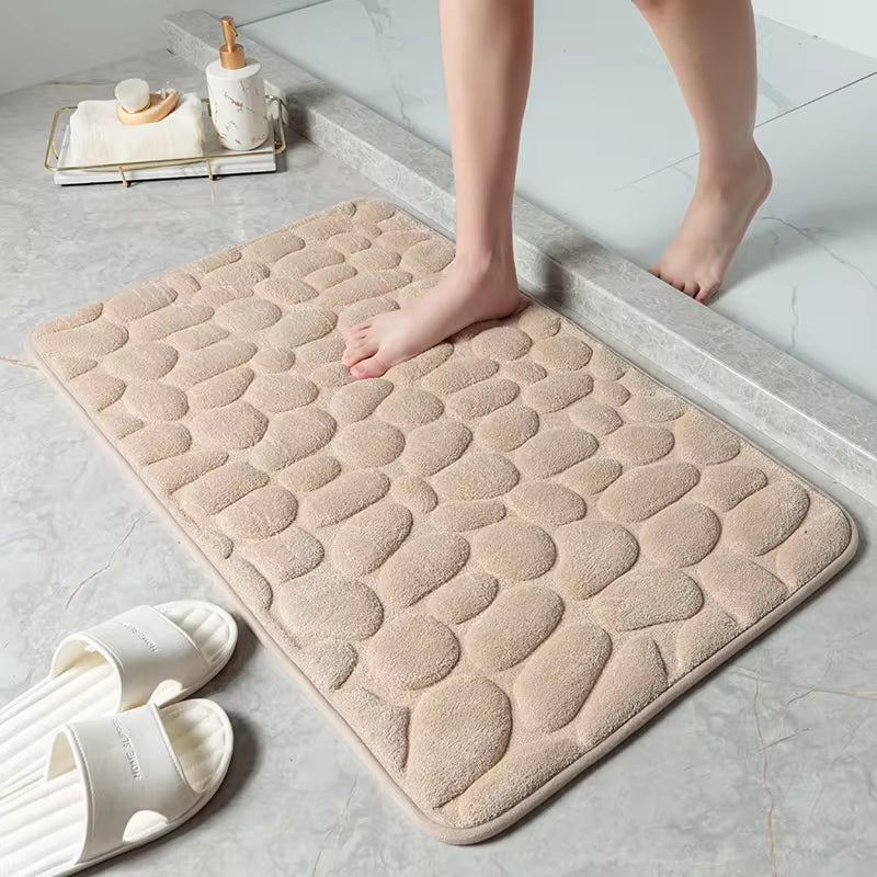 Transform your bathroom with our stylish Cobblestone Embossed Non-Slip Bath Mat! Perfect for the shower, bathtub, or wash basin, this memory foam rug adds comfort and safety to your space. 🛁✨ #HomeDecor #BathroomEssentials