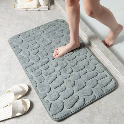 Transform your bathroom with our stylish Cobblestone Embossed Non-Slip Bath Mat! Perfect for the shower, bathtub, or wash basin, this memory foam rug adds comfort and safety to your space. 🛁✨ #HomeDecor #BathroomEssentials