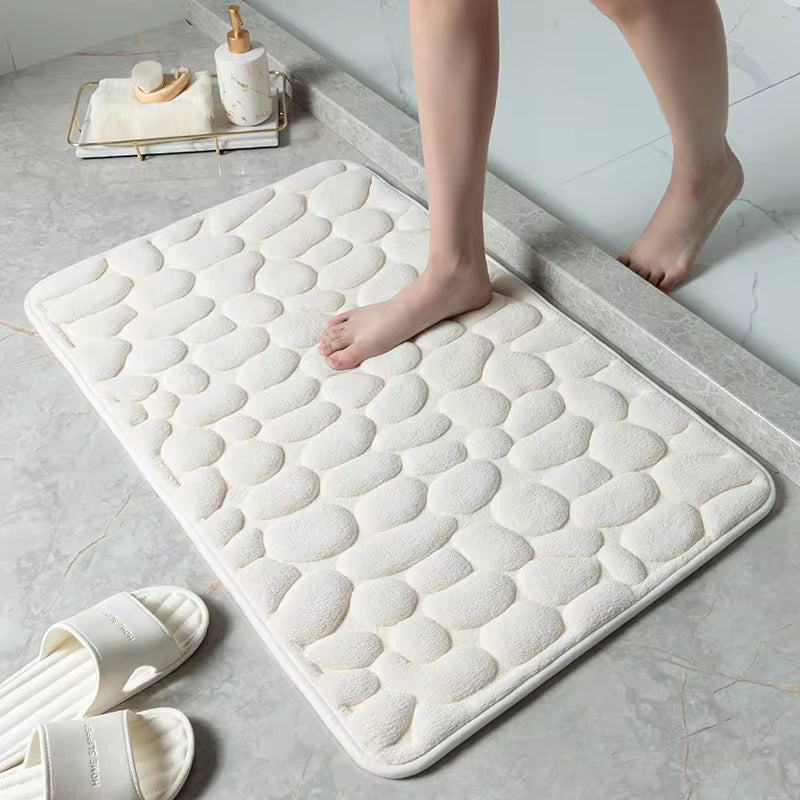 Transform your bathroom with our stylish Cobblestone Embossed Non-Slip Bath Mat! Perfect for the shower, bathtub, or wash basin, this memory foam rug adds comfort and safety to your space. 🛁✨ #HomeDecor #BathroomEssentials