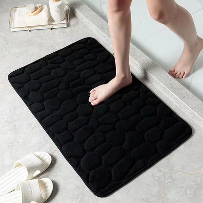 Transform your bathroom with our stylish Cobblestone Embossed Non-Slip Bath Mat! Perfect for the shower, bathtub, or wash basin, this memory foam rug adds comfort and safety to your space. 🛁✨ #HomeDecor #BathroomEssentials