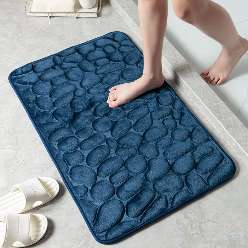 Transform your bathroom with our stylish Cobblestone Embossed Non-Slip Bath Mat! Perfect for the shower, bathtub, or wash basin, this memory foam rug adds comfort and safety to your space. 🛁✨ #HomeDecor #BathroomEssentials